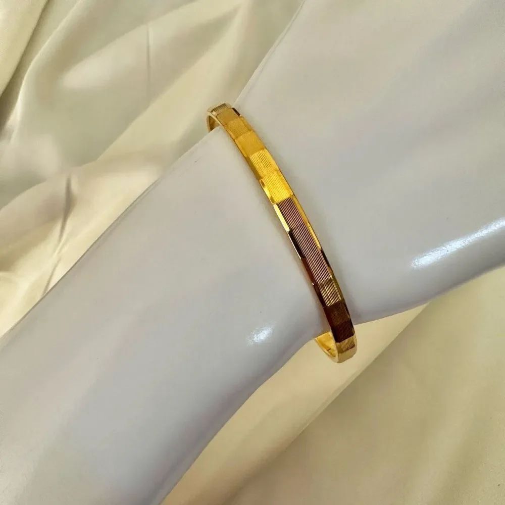 Monet gold tone bangle bracelet